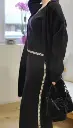 Ensemble pull sans manches et jupe Noire